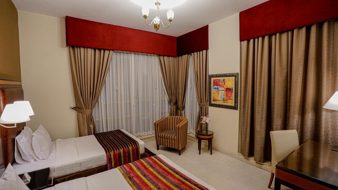 Xclusive Hotel Apartments Дубай Экстерьер фото
