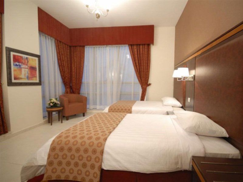 Xclusive Hotel Apartments Дубай Экстерьер фото